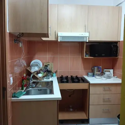 a kitchen with a sink and a stove at ManubelaRelax in Praia
