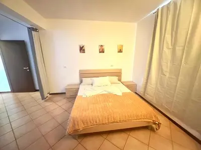 a bedroom with a bed in a room at near the beach On bedroom flat very good in Santa Maria