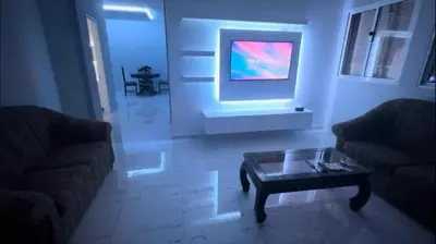 a living room with two couches and a coffee table at Apartamento T2 mobiliado in Mindelo