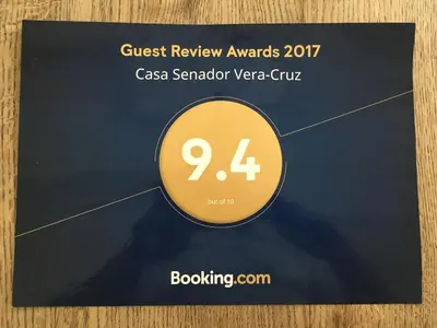 a sign that says guest review awards caa strawberry verve guru at Casa Senador in Mindelo