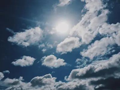 a sky filled with clouds with the sun in it at Casa Senador in Mindelo