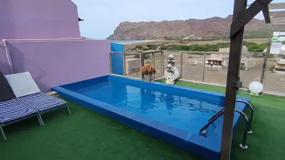 a small pool on a balcony with a view at Pousada B&B Le Gourmet in São Pedro