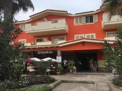 a view of the hotel from the courtyard at SAL at HOME in Santa Maria