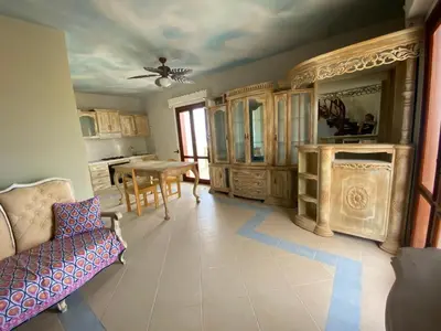 a large living room with a couch and a table at Vista Do Mar Sea View WI-FI FREE Sal Rei in Sal Rei