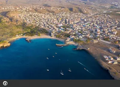 an aerial view of a beach with boats in the water at Pensao Mille Nuits in Tarrafal