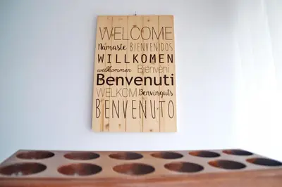a sign that reads welcome to millemite with a chocolate bar at Ouril Hotel Julia in Santa Maria