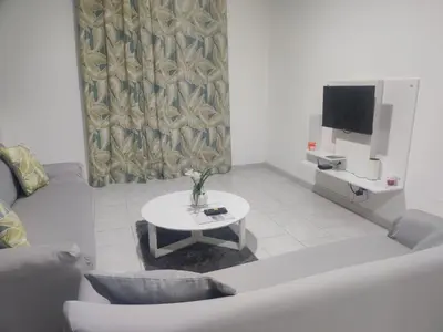 a living room with a couch and a table at Apartamento Llana in Santa Maria