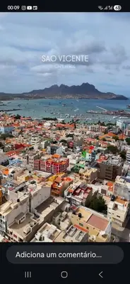 a view of a city with buildings and the ocean at Avenida Dr Baltazar Lopes da Silva 33A in Mindelo