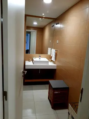 a bathroom with a sink and a mirror at Apartment with pool in Mindelo in Mindelo