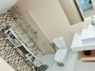 a bathroom with a toilet and a sink at Apartment with pool in Mindelo in Mindelo