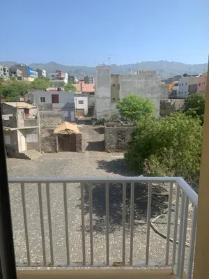 a view of a city from a balcony at Residencial Pôr do Sol in Porto Novo