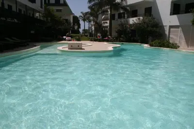 a large pool of blue water with a laptop in it at Leme Bedje fronte spiaggia in Santa Maria