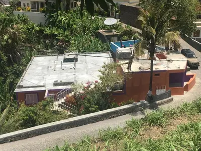 an overhead view of a house with a swimming pool at Casa Familiar Gilda in Ribeira Grande