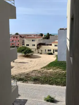 a view of an empty yard from a building at Rosa dei Venti Apartment 50meter beach front in Sal Rei