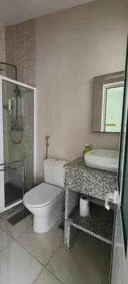 a bathroom with a toilet and a sink and a shower at LA MENOR in Ribeira Grande