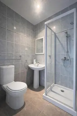 a bathroom with a toilet and a shower and a sink at Casa BB&Djassi - SUITES in Ponta do Sol