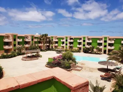a view of the courtyard of a resort with a swimming pool at Appartement Amalia Sal Santa Maria in Prainha