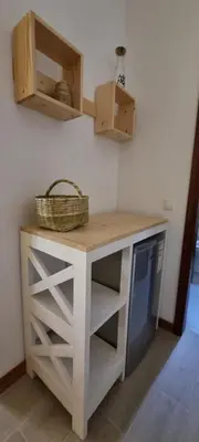 a kitchen counter with a basket on top of it at Kasa d'Vizin in Paul