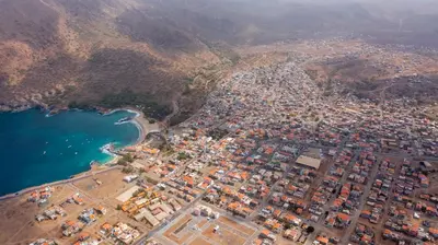 an aerial view of a city next to the ocean at Oasis Tarrafal Alfandega Suites in Tarrafal