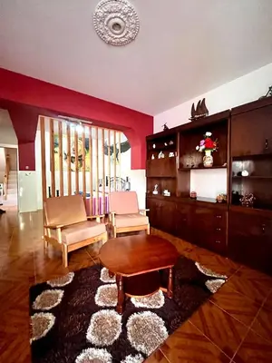 a living room with a table and some chairs and a table at Casa BB&Djassi - ROOMS in Ponta do Sol