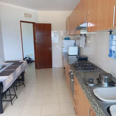 a kitchen with a sink and a counter top at Recanto Verde Cara in Mindelo