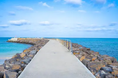 a pathway leading to the ocean on a pier at Casa Cubada in Santa Maria