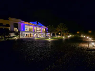 a building with purple lights on it at night at Casa Cubada in Santa Maria