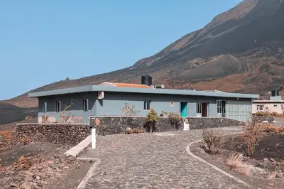 a house in the middle of a mountain at Casa Ze & sonia in Portela