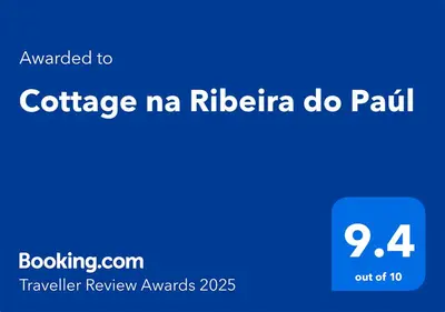 a blue sign with the words conference ma ritzeria do perl at Cottage na Ribeira do Paúl in Pombas
